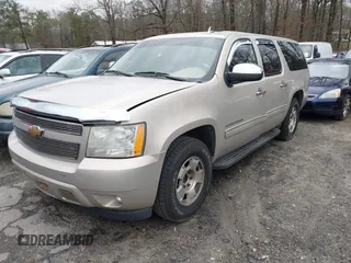 2010 Chevrolet Suburban LS with VIN 1GNUCHE03AR226103, listed as a IAAI auction lot 41729881 with 201,479 mi miles. Bid and sale history available at carsss.com. Image 2.