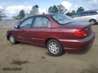 2003 Kia Spectra with VIN KNAFB121935241589, listed as a Copart auction lot 71933194 with 61,738 mi miles and Salvage Title. Bid and sale history available at carsss.com. Image 2.