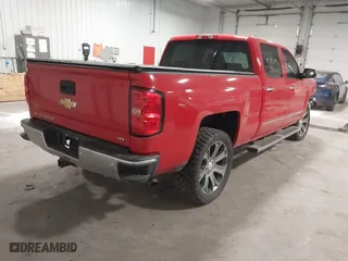 2014 Chevrolet Silverado 1500 LTZ with VIN 3GCUKSEC3EG360490, listed as a IAAI auction lot 41248196 with 131,633 mi miles. Bid and sale history available at carsss.com. Image 4.