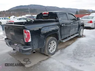 2015 GMC Canyon 4WD SLT with VIN 1GTG6CE39F1202730, listed as a IAAI auction lot 41510275 with 114,444 mi miles. Bid and sale history available at carsss.com. Image 4.