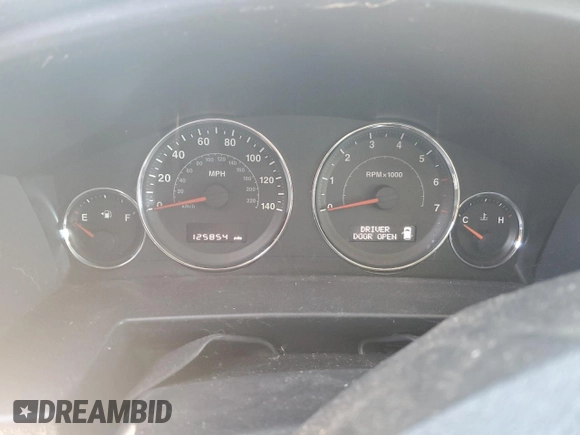 2010 Jeep Commander Sport with VIN 1J4RG4GK8AC131575, listed as a Copart auction lot 45287345 with 125,854 mi miles and Salvage title. Bid and sale history available at DreamBid. Image 9.