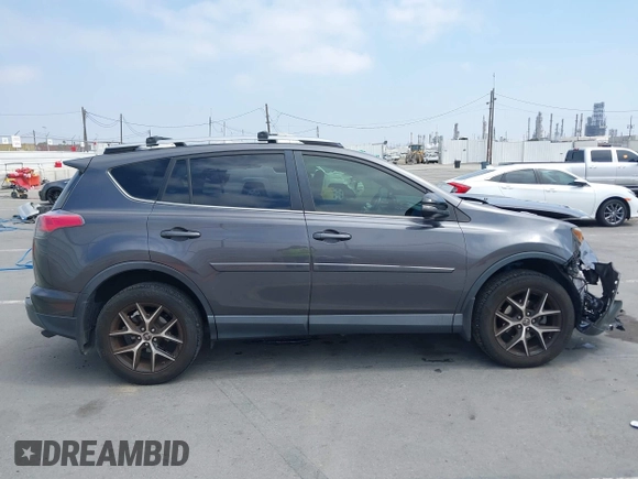 2017 Toyota RAV4 SE with VIN JTMJFREV5HJ155712, listed as a IAAI auction lot 42613998 with 72,112 mi miles and . Bid and sale history available at DreamBid. Image 13.