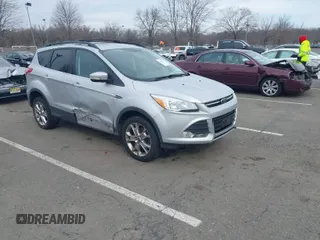 2013 Ford Escape SEL with VIN 1FMCU9HX0DUC58424, listed as a IAAI auction lot 41607775 with 120,147 mi miles. Bid and sale history available at carsss.com. Image 1.