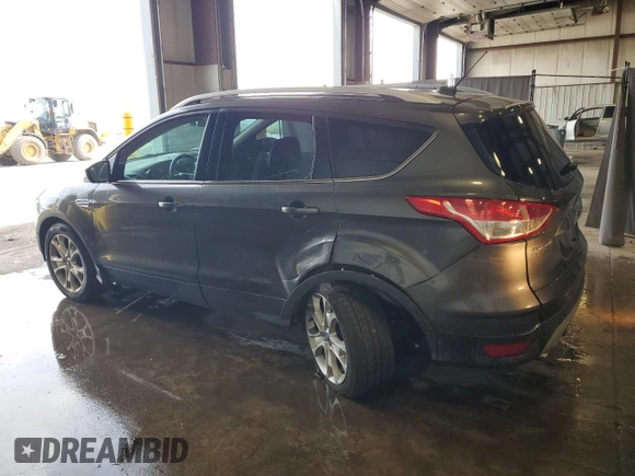 2016 Ford Escape Titanium with VIN 1FMCU9J92GUA89930, listed as a Copart auction lot 64441475 with 80,713 mi miles and Salvage title. Bid and sale history available at DreamBid. Image 2.
