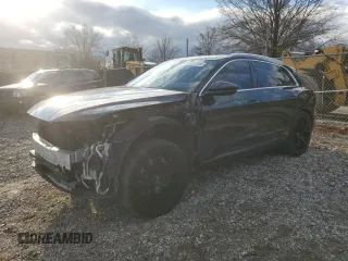 2019 Audi e-tron Prestige with VIN WA1VABGEXKB011864, listed as a Copart auction lot 87221984 with 56,150 mi miles and Salvage title. Bid and sale history available at DreamBid. Image 1.