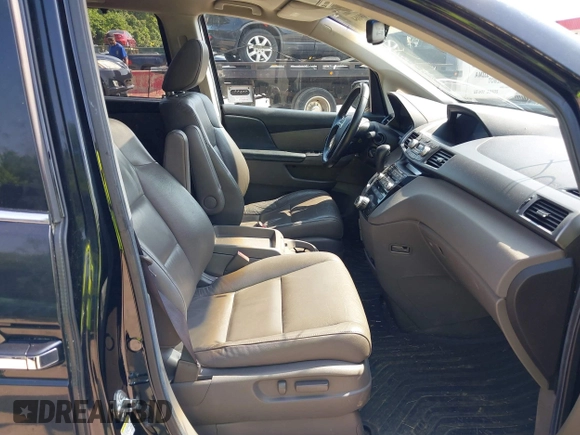 2011 Honda Odyssey Touring with VIN 5FNRL5H97BB073708, listed as a IAAI auction lot 42409164 with 141,986 mi miles and . Bid and sale history available at DreamBid. Image 5.