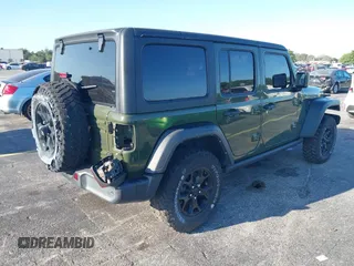 2021 Jeep Wrangler Unlimited 80th Anniversary with VIN 1C4HJXDN6MW685090, listed as a IAAI auction lot 41816088 with 31,546 mi miles and . Bid and sale history available at DreamBid. Image 4.