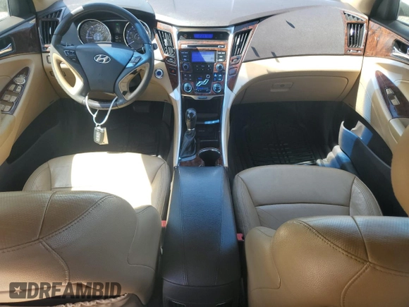 2012 Hyundai Sonata Limited with VIN 5NPEC4AC0CH434116, listed as a Copart auction lot 55217325 with 128,011 mi miles and Salvage Title. Bid and sale history available at DreamBid. Image 8.