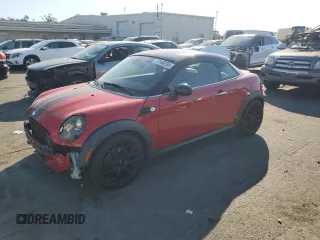 2012 MINI Cooper Coupe with VIN WMWSX1C5XCT163790, listed as a Copart auction lot 73148734 with 144,323 mi miles and Salvage Title. Bid and sale history available at carsss.com. Image 1.