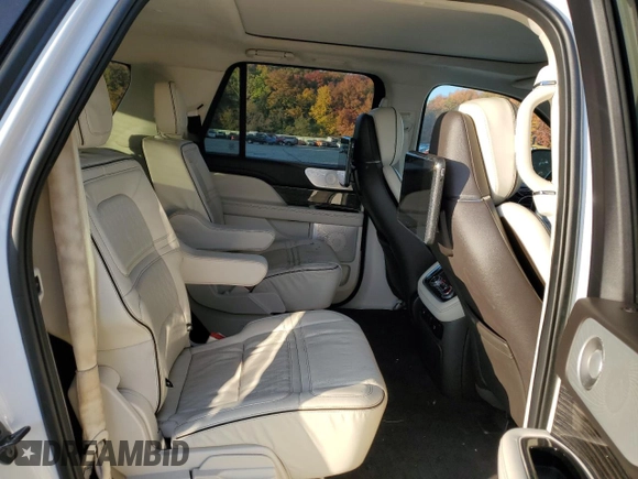 2021 Lincoln Navigator Black Label z VIN 5LMJJ3TT5MEL00238, wystawiony jako Copart lot #76951964 z przebiegiem 69 712 mil mil oraz Szkoda całkowita • Salvage title. Historia ofert i sprzedaży dostępna na DreamBid. Obrazek 11.