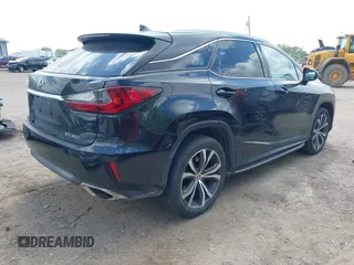 2017 Lexus RX 350 with VIN 2T2BZMCA8HC066061, listed as a IAAI auction lot 42203677 with 165,618 mi miles and . Bid and sale history available at DreamBid. Image 4.