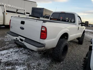 2007 Ford F-350 XL with VIN 1FTWF31P77EB13964, listed as a Copart auction lot 86046944 with 126,568 mi miles and Salvage title. Bid and sale history available at DreamBid. Image 4.