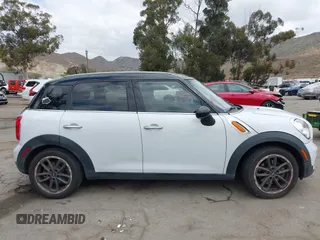 2015 MINI Countryman with VIN WMWZB3C57FWR46707, listed as a IAAI auction lot 42114457 with 137,356 mi miles and . Bid and sale history available at DreamBid. Image 13.
