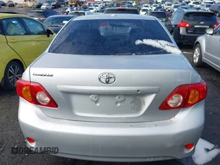 2009 Toyota Corolla with VIN JTDBL40E899083155, listed as a IAAI auction lot 41056942 with 294,132 mi miles. Bid and sale history available at carsss.com. Image 16.