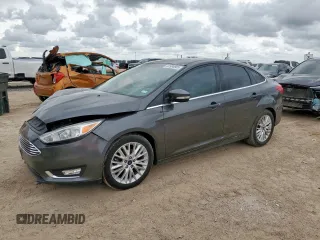 2018 Ford Focus Titanium z VIN 1FADP3J29JL294213, wystawiony jako Copart lot #62994865 z przebiegiem 110 718 mil mil oraz Szkoda całkowita • Salvage title. Historia ofert i sprzedaży dostępna na DreamBid. Obrazek 1.