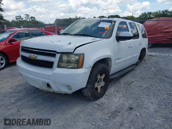 2007 Chevrolet Tahoe LTZ with VIN 1GNFC13J07J153453, listed as a IAAI auction lot 42691432 with Not provided miles and . Bid and sale history available at DreamBid. Image 2.