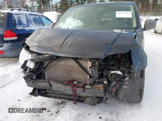 2012 Dodge Grand Caravan SE with VIN 2C4RDGBG7CR139874, listed as a IAAI auction lot 41377432 with 136,870 mi miles and . Bid and sale history available at DreamBid. Image 6.