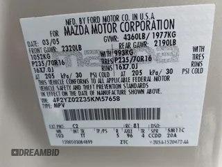 2005 Mazda Tribute i with VIN 4F2YZ02Z35KM57658, listed as a IAAI auction lot 41547562 with 131,303 mi miles and . Bid and sale history available at carsss.com. Image 9.