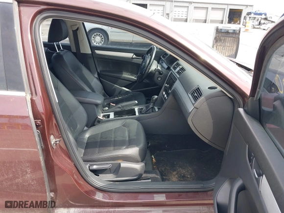 2012 Volkswagen Passat SE w/Sunroof with VIN 1VWBH7A31CC076037, listed as a IAAI auction lot 41905200 with 141,809 mi miles. Bid and sale history available at carsss.com. Image 5.
