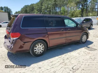 2010 Honda Odyssey LX z VIN 5FNRL3H25AB004652, wystawiony jako Copart lot #54923025 z przebiegiem 335 312 mil mil oraz Szkoda całkowita • Salvage title. Historia ofert i sprzedaży dostępna na DreamBid. Obrazek 3.