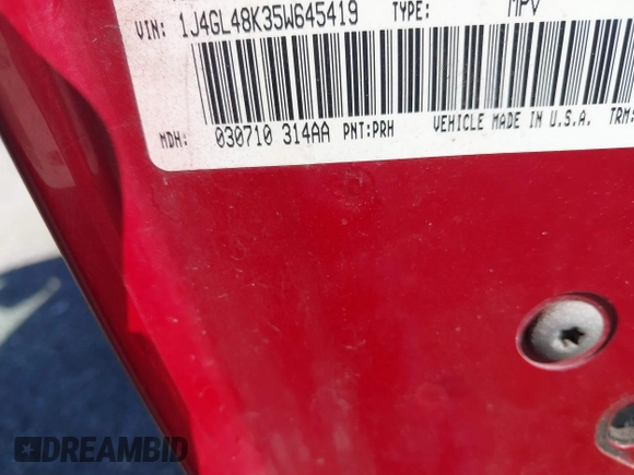 2005 Jeep Liberty Sport with VIN 1J4GL48K35W645419, listed as a IAAI auction lot 41823845 with 168,896 mi miles. Bid and sale history available at carsss.com. Image 9.