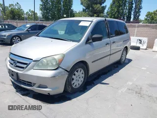 2007 Honda Odyssey LX z VIN 5FNRL38217B016001, wystawiony jako IAAI lot #42603816 z przebiegiem 209 630 mil mil oraz . Historia ofert i sprzedaży dostępna na DreamBid. Obrazek 2.
