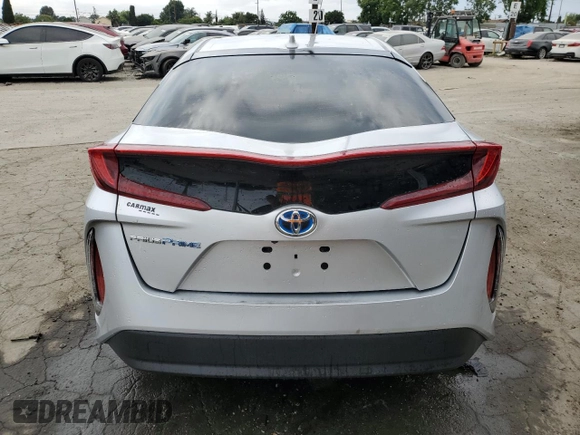 2022 Toyota Prius LE с VIN JTDKAMFP5N3202100, выставлен на аукционе Copart как лот 59570825 с пробегом 32 941 миль миль и Списание • Salvage title. История ставок и продаж доступна на DreamBid. Изображение 6.