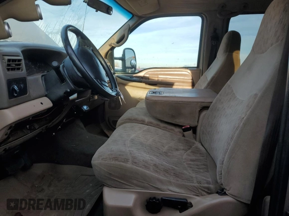 1999 Ford F-350 XL with VIN 1FTWW32F4XED06675, listed as a Copart auction lot 78982514 with 329,060 mi miles and Salvage title. Bid and sale history available at DreamBid. Image 7.