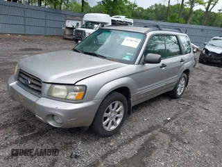 2005 Subaru Forester XS with VIN JF1SG65605H745494, listed as a IAAI auction lot 42382364 with 256,505 mi miles and . Bid and sale history available at DreamBid. Image 2.