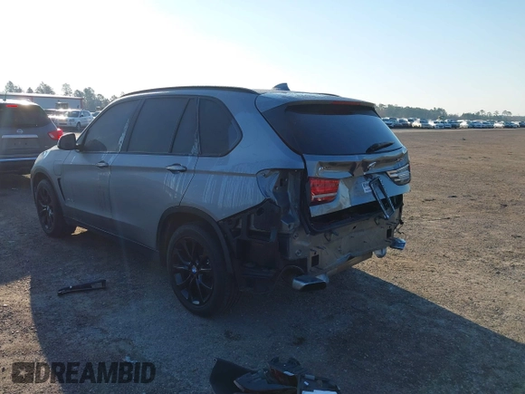 2016 BMW X5 xDrive40e with VIN 5UXKT0C57G0S75476, listed as a IAAI auction lot 41642249 with 105,489 mi miles and . Bid and sale history available at DreamBid. Image 3.