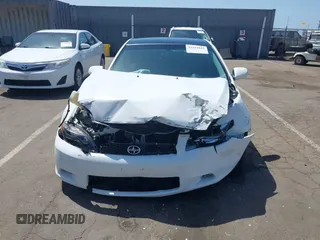 2006 Scion tC with VIN JTKDE167160120517, listed as a IAAI auction lot 42111042 with 174,220 mi miles. Bid and sale history available at carsss.com. Image 13.
