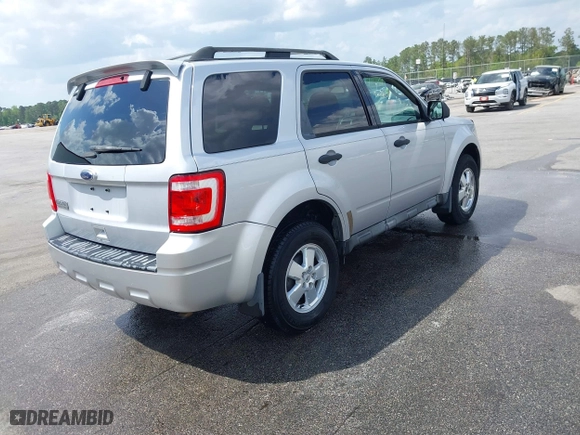 2011 Ford Escape XLT with VIN 1FMCU9D73BKB26014, listed as a IAAI auction lot 41954987 with 156,433 mi miles. Bid and sale history available at carsss.com. Image 4.