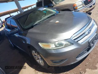 2011 Ford Taurus SEL z VIN 1FAHP2EW3BG150319, wystawiony jako IAAI lot #41828530 z przebiegiem 150 050 mil mil oraz . Historia ofert i sprzedaży dostępna na DreamBid. Obrazek 1.