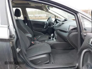 2016 Ford Fiesta SE with VIN 3FADP4BJ2GM196952, listed as a IAAI auction lot 41694838 with 121,192 mi miles and . Bid and sale history available at DreamBid. Image 5.