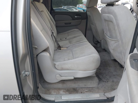 2007 Chevrolet Suburban LT with VIN 1GNFC16007R231427, listed as a IAAI auction lot 40995668 with 168,691 mi miles and . Bid and sale history available at DreamBid. Image 8.