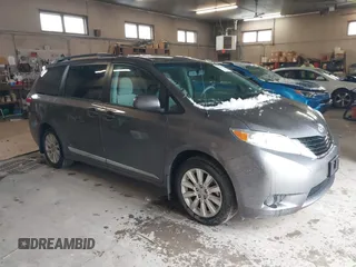 2014 Toyota Sienna LE with VIN 5TDJK3DC9ES071870, listed as a IAAI auction lot 41133491 with 82,134 mi miles. Bid and sale history available at carsss.com. Image 1.