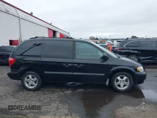 2007 Dodge Caravan SXT with VIN 1D4GP45R87B161237, listed as a IAAI auction lot 41594127 with 154,508 mi miles and . Bid and sale history available at DreamBid. Image 13.
