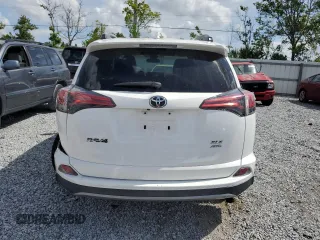 2018 Toyota RAV4 XLE with VIN 2T3RFREV1JW843426, listed as a Copart auction lot 52283125 with 12,809 mi miles and Salvage Title. Bid and sale history available at DreamBid. Image 6.