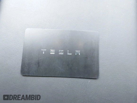 2023 Tesla Model Y Long Range z VIN 7SAYGAEE7PF691499, wystawiony jako IAAI lot #42038850 z przebiegiem 26 439 mil mil oraz . Historia ofert i sprzedaży dostępna na DreamBid. Obrazek 11.