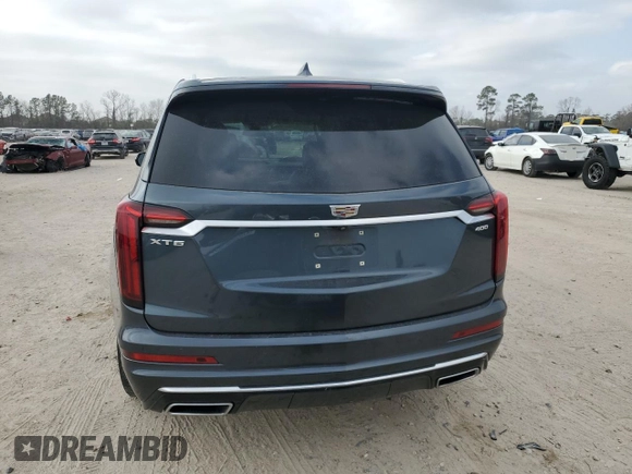 2021 Cadillac XT6 Premium Luxury with VIN 1GYKPCRS4MZ147444, listed as a Copart auction lot 44636035 with 38,160 mi miles and Salvage Title. Bid and sale history available at DreamBid. Image 6.