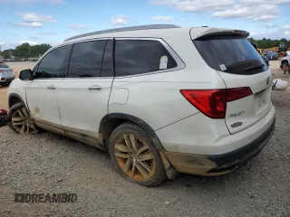 2017 Honda Pilot Touring z VIN 5FNYF6H92HB067140, wystawiony jako Copart lot #72200584 z przebiegiem 127 856 mil mil oraz Szkoda całkowita • Salvage title. Historia ofert i sprzedaży dostępna na DreamBid. Obrazek 2.