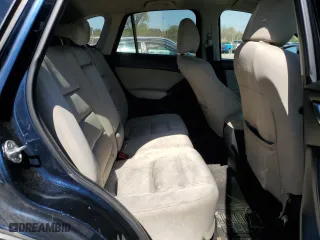 2014 Mazda CX-5 Touring with VIN JM3KE4CY4E0407868, listed as a Copart auction lot 52564315 with 137,989 mi miles and Salvage Title. Bid and sale history available at carsss.com. Image 11.