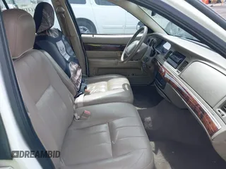 2004 Mercury Grand Marquis LS Premium z VIN 2MEFM75W04X678032, wystawiony jako IAAI lot #42341419 z przebiegiem 114 502 mil mil oraz . Historia ofert i sprzedaży dostępna na DreamBid. Obrazek 5.