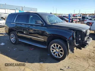 2015 GMC Yukon Denali with VIN 1GKS1CKJ9FR134446, listed as a Copart auction lot 77460274 with 158,903 mi miles and Clean Title. Bid and sale history available at carsss.com. Image 4.