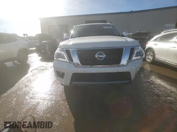 2019 Nissan Armada Platinum with VIN JN8AY2NE9K9758483, listed as a Copart auction lot 42636495 with 43,952 mi miles and Salvage Title. Bid and sale history available at carsss.com. Image 14.