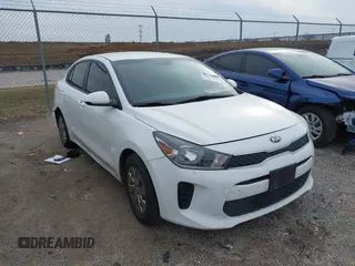 2019 Kia Rio S with VIN 3KPA24ABXKE215756, listed as a IAAI auction lot 41556461 with 122,300 mi miles. Bid and sale history available at carsss.com. Image 1.