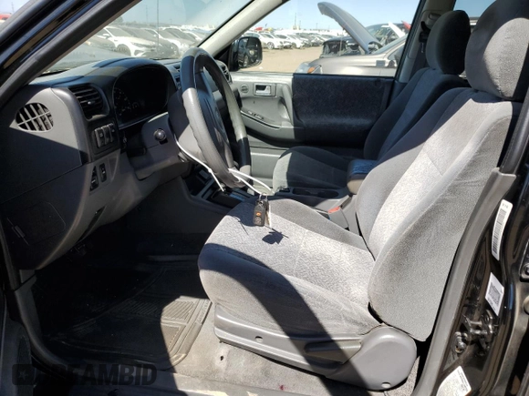 2001 Isuzu Rodeo S with VIN 4S2DM58W914354772, listed as a Copart auction lot 72208564 with 146,507 mi miles and Salvage Title. Bid and sale history available at carsss.com. Image 7.