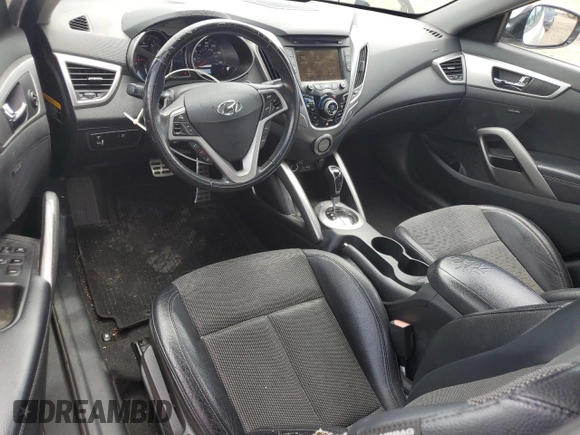 2013 Hyundai Veloster w/Gray Int z VIN KMHTC6AD3DU135296, wystawiony jako Copart lot #59778985 z przebiegiem 125 134 mil mil oraz Czysty tytuł • Clean title. Historia ofert i sprzedaży dostępna na DreamBid. Obrazek 8.