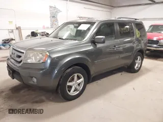 2011 Honda Pilot EX-L with VIN 5FNYF4H55BB039079, listed as a IAAI auction lot 42029278 with 173,216 mi miles. Bid and sale history available at carsss.com. Image 17.