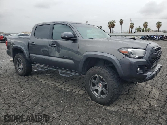 2016 Toyota Tacoma SR with VIN 3TMCZ5AN6GM018536, listed as a Copart auction lot 49336645 with 103,298 mi miles and Salvage Title. Bid and sale history available at carsss.com. Image 4.
